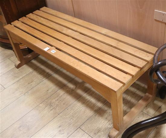 A teak garden bench, W.121cm